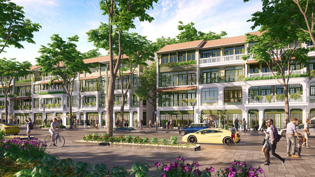Sun Bắc Ninh 8 Hình ảnh dãy townhouse tại Sun Bắc Ninh với kiến trúc 4 tầng, mặt tiền thoáng, tầng trệt là các cửa hàng tiện lợi, phía trước có đường lớn, cây xanh và cư dân vui chơi, dạo bộ.